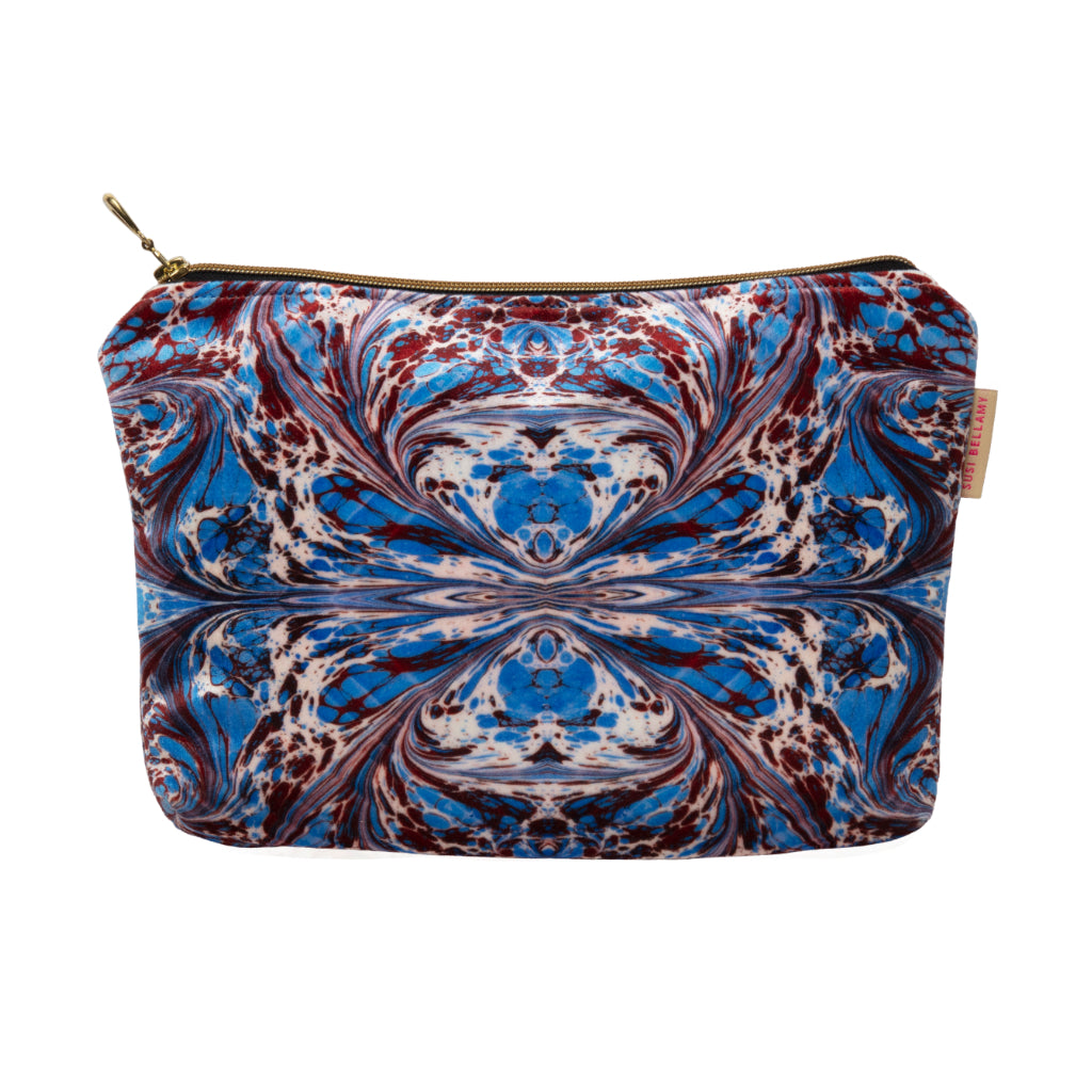 Blue Marbled patterned velvet pouch on a white background