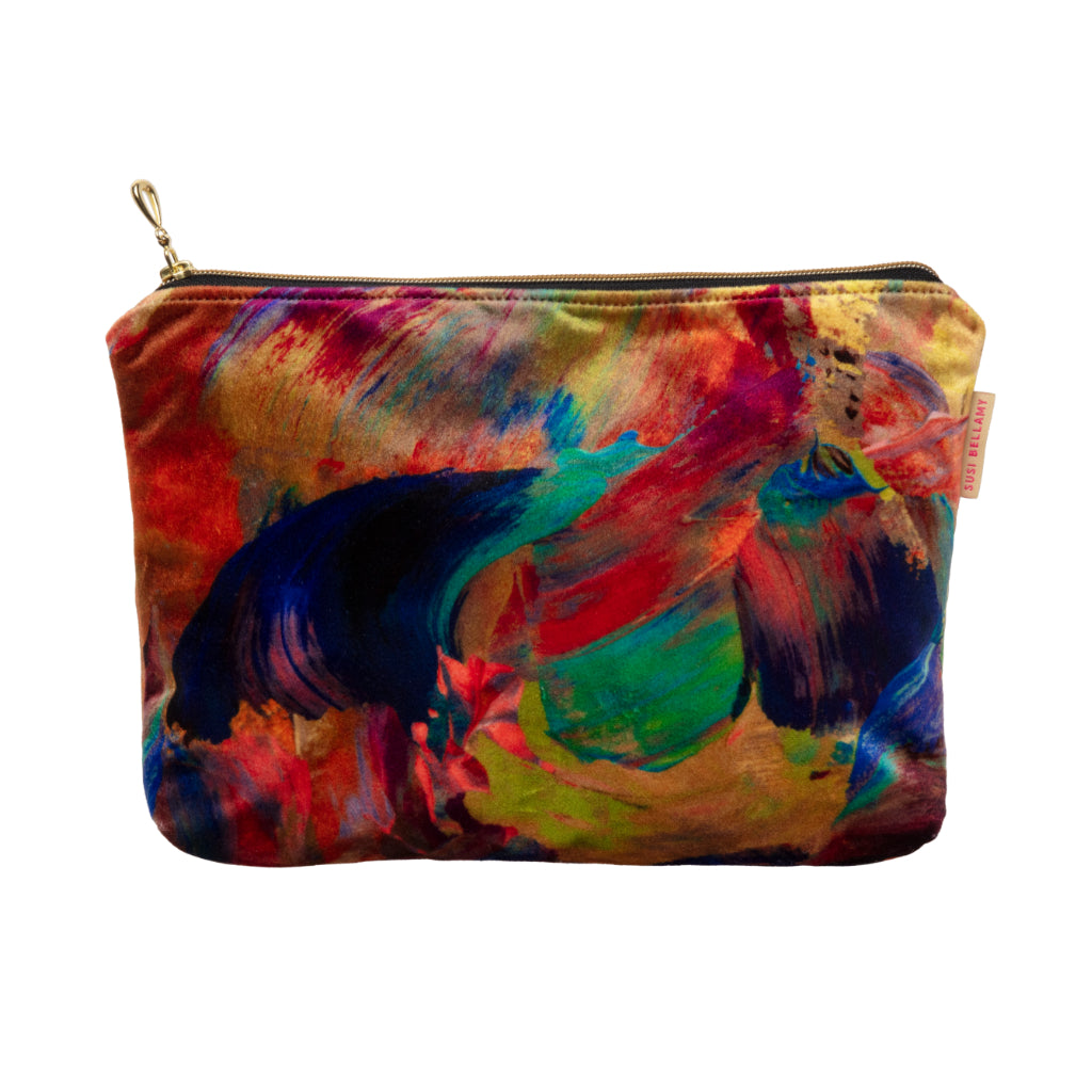 Colourful abstract velvet pouch with abstract design on a white background