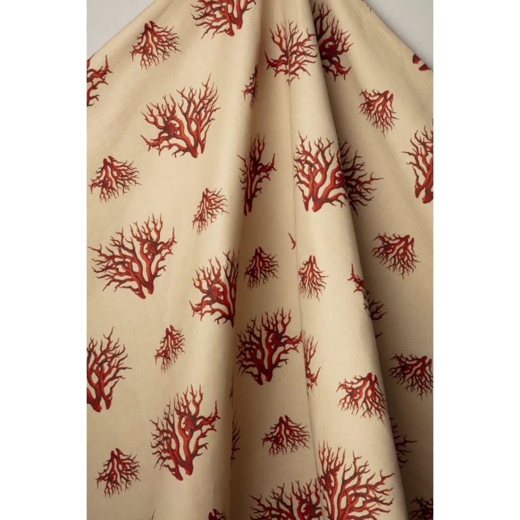 Beige fabric with red coral pattern