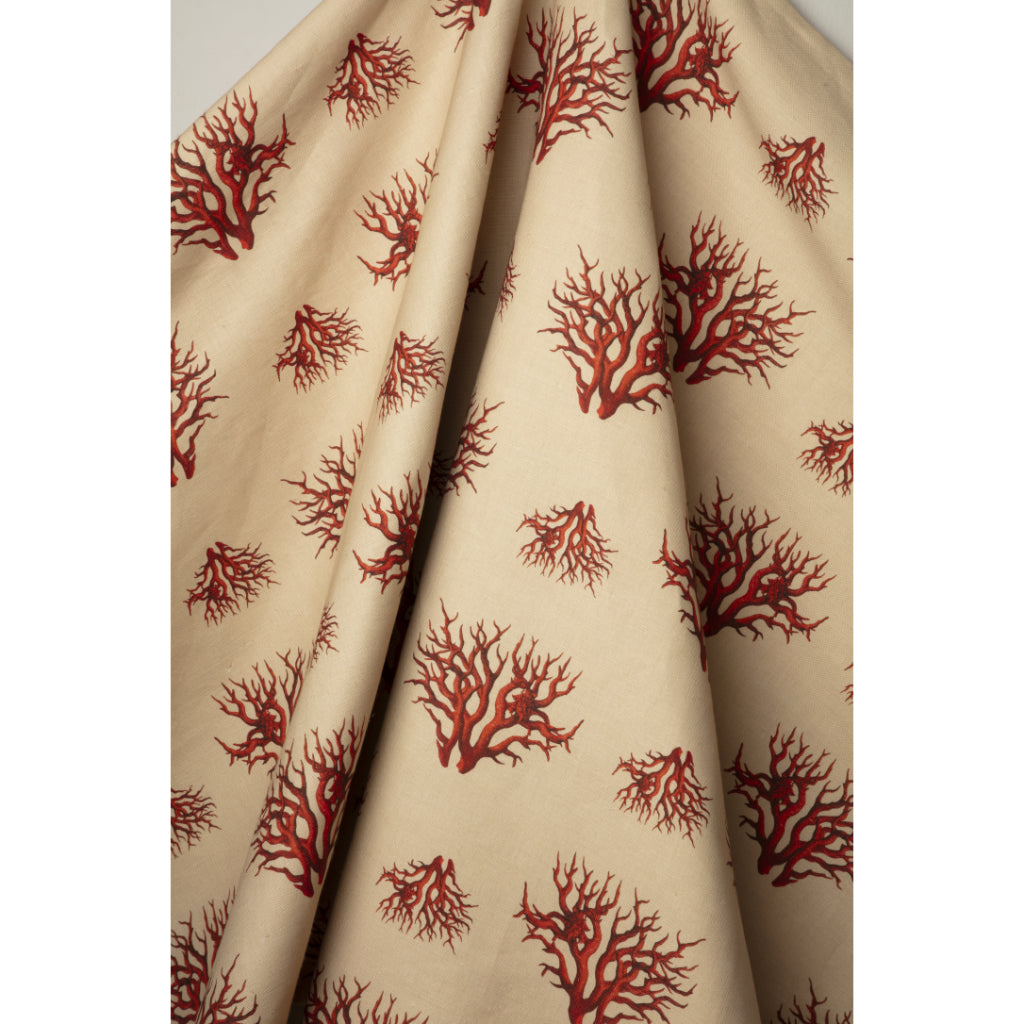 Beige fabric with red coral pattern