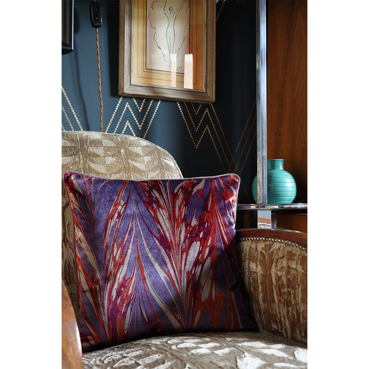 Velvet patterned cushion on chair