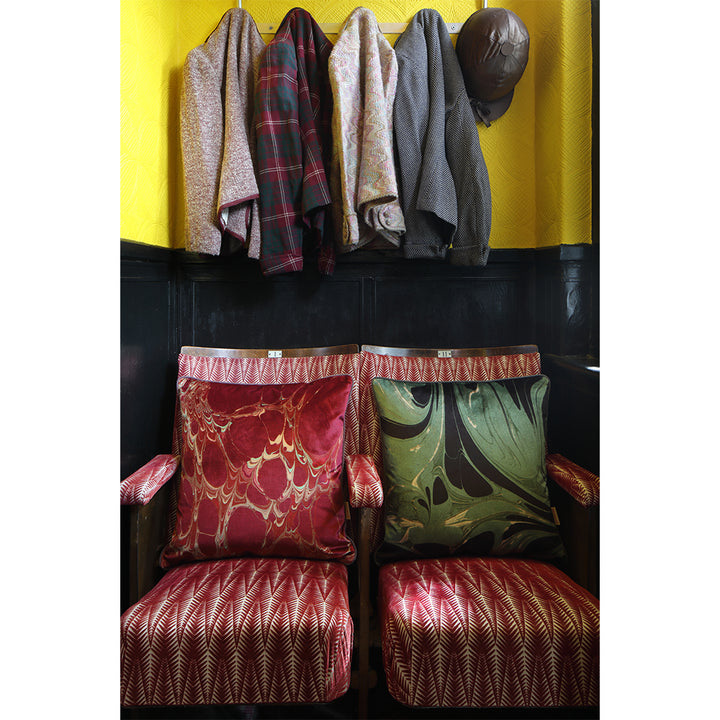 Patterned velvet cushions on vintage seats