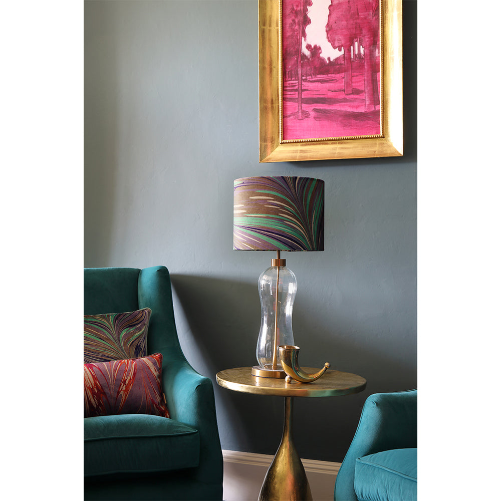 Patterned velvet lamp shade on side table