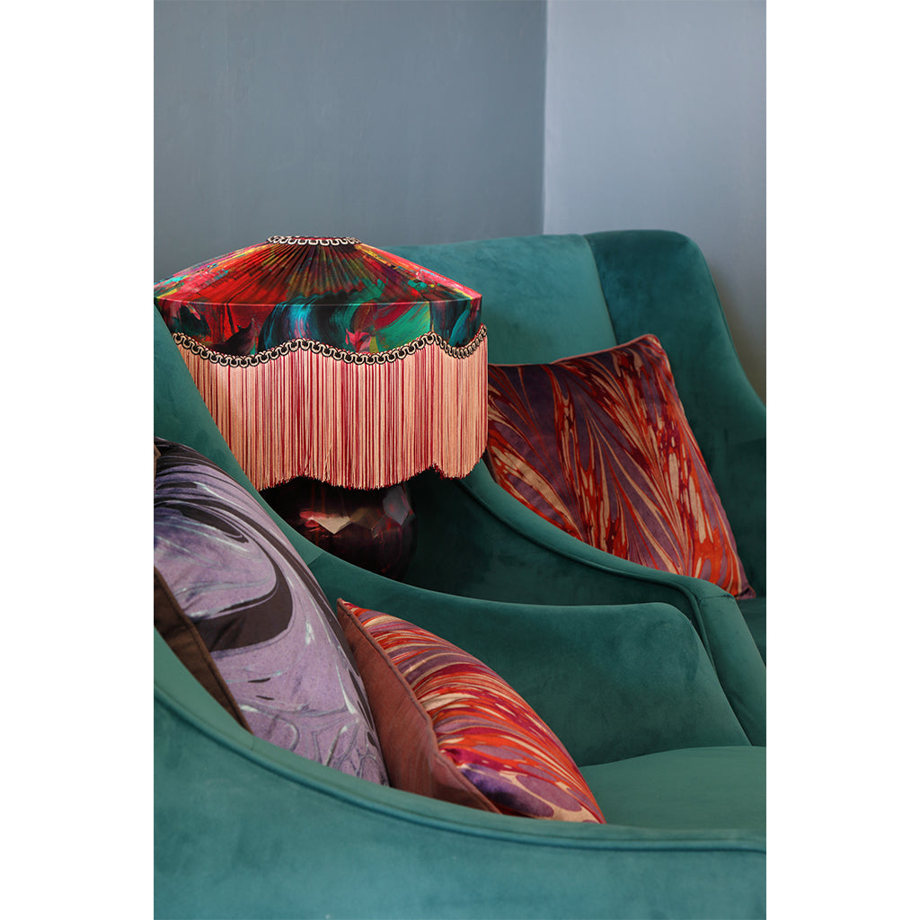 Side view of velvet colourful cushions