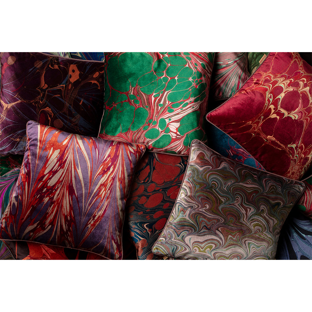 Pile of velvet cushions