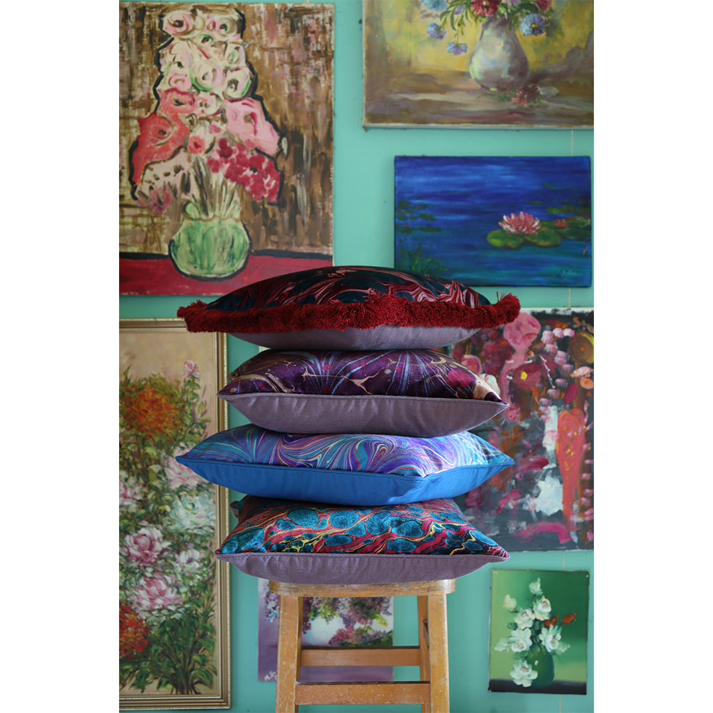 Pile of luxurious velvet cushions