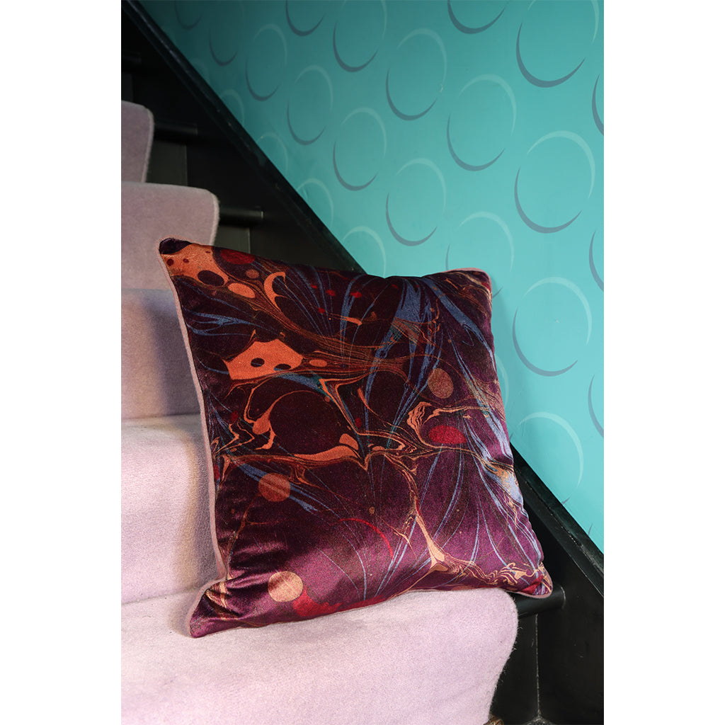 Velvet patterned purple cushion 