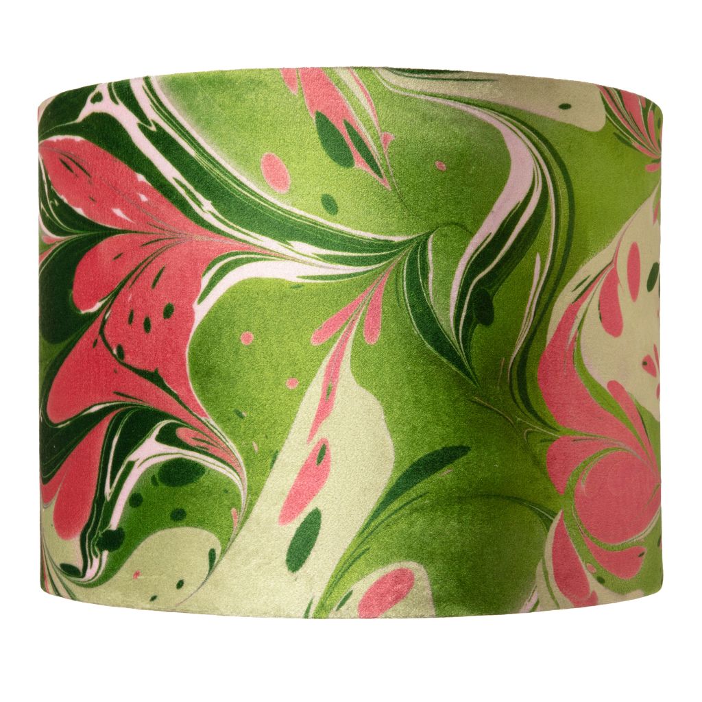 A drum lampshade featuring a vibrant green, pink, and cream marbled abstract pattern on a solid white background.