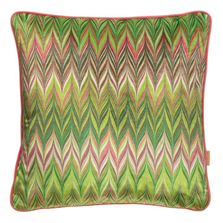 A square decorative throw pillow featuring a vibrant green, pink, and beige zigzag pattern with a solid coral pink piped edge.