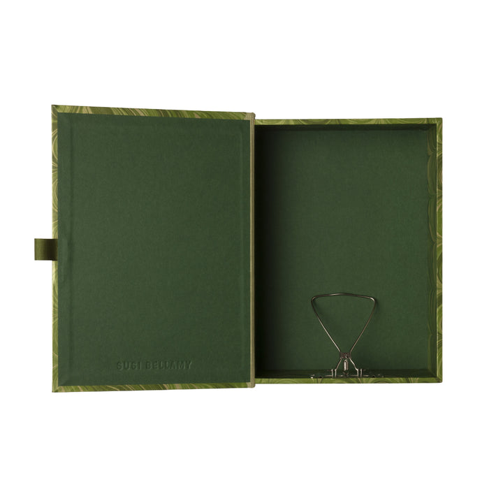 Green marbled patterned box file on a white background