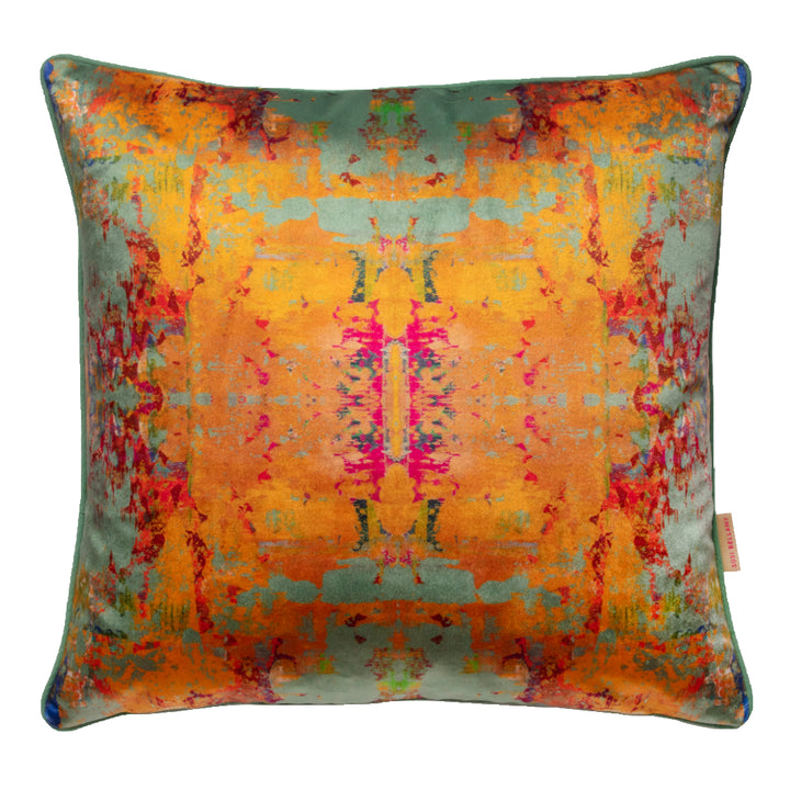 Multicolored abstract patterned pillow on a white background