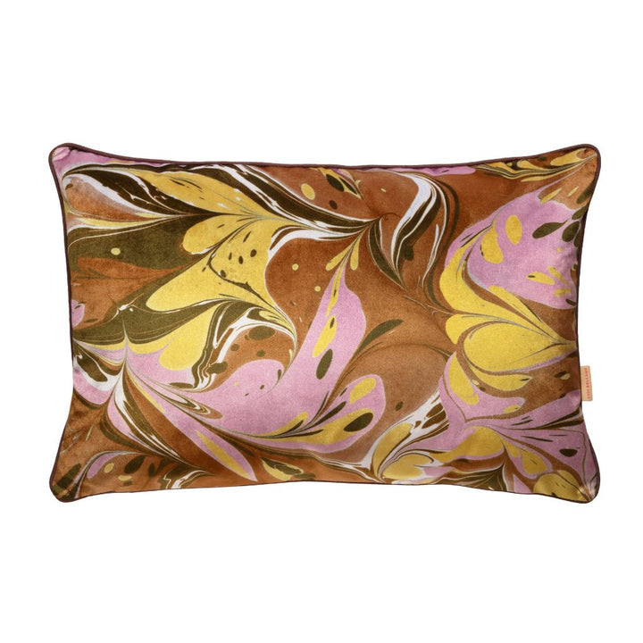 A rectangular lumbar throw pillow featuring an abstract marbled pattern in brown, yellow, lavender, and white, shown against a plain white background.
