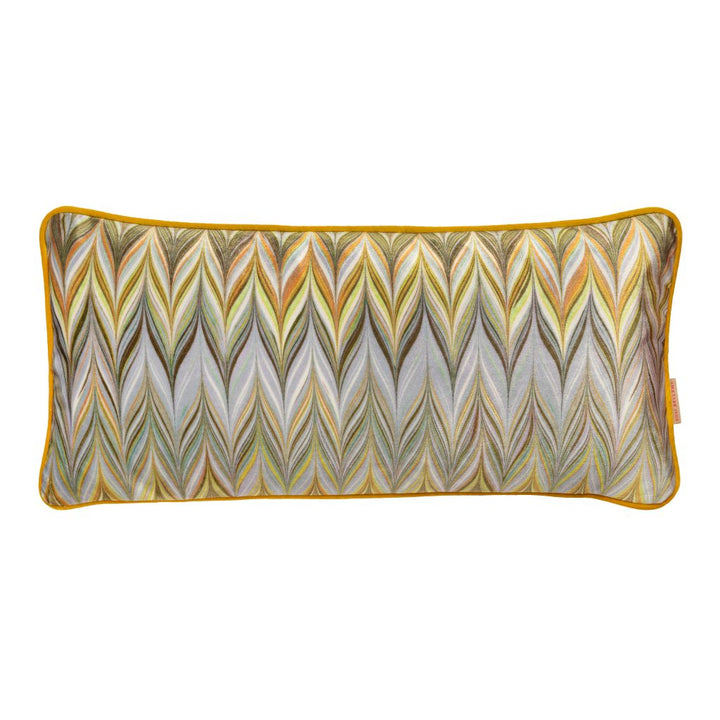 A rectangular lumbar pillow featuring a colorful chevron pattern in shades of yellow, green, gray, and white, finished with a mustard yellow piped border.
