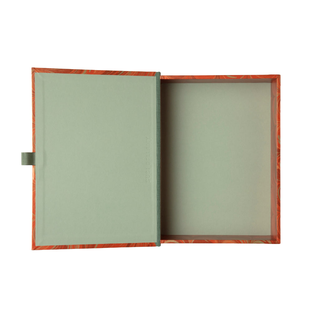 Red wavy comb pattern box file on white background