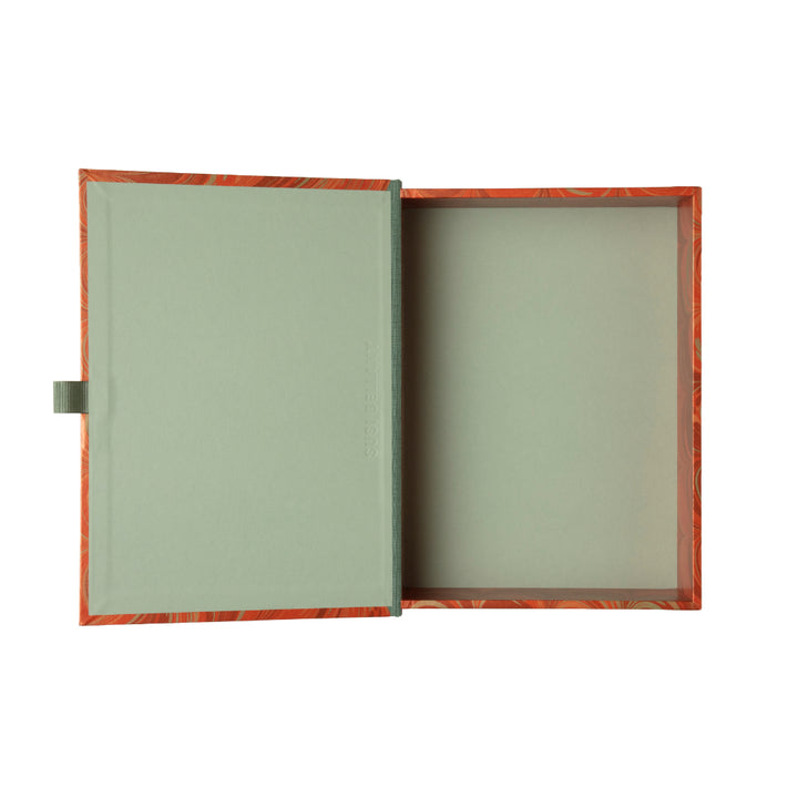 Red wavy comb pattern box file on white background