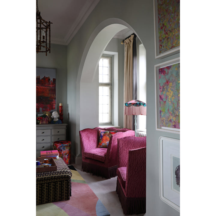 Fringed vintage chairs upholstered in Mulberry Veneer purple velvet fabric