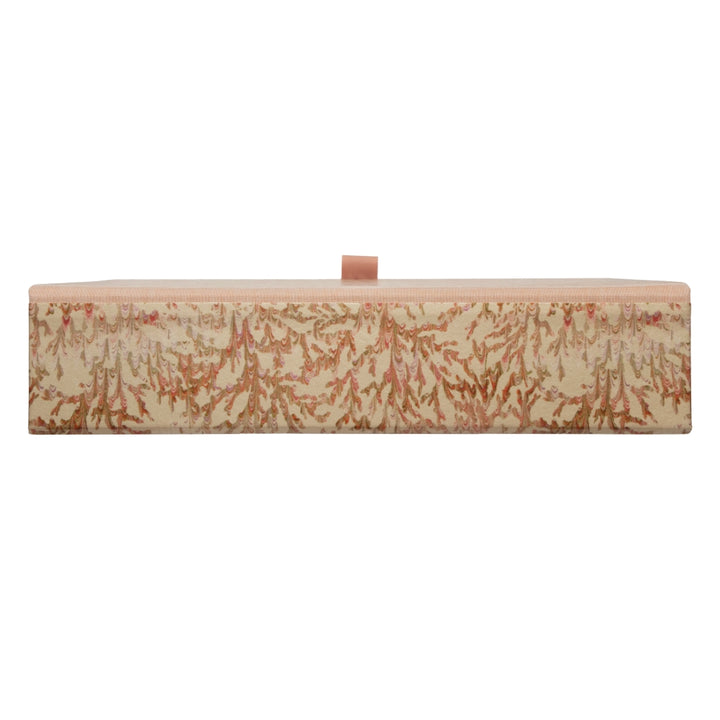 Pastel coloured box file in coral and marbled pattern