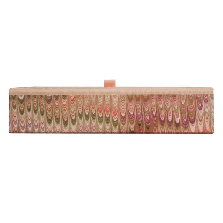 Marbled patterned pink box file on a white background