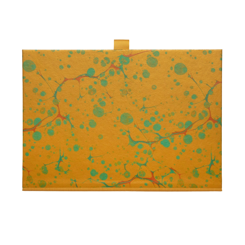 Marbled paper box file in yellow saffron, green and red marbled pattern on white background