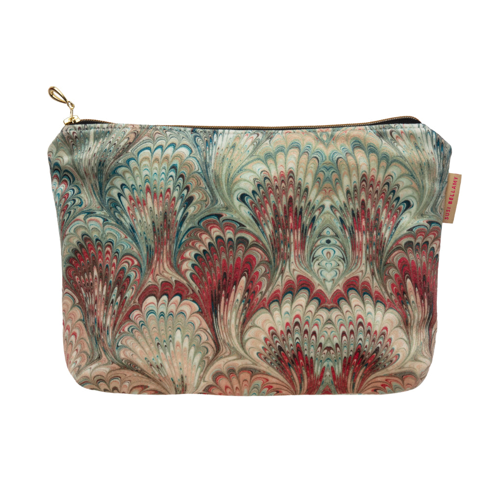 Marbled patterned neutral pouch with gold zipper on a white background