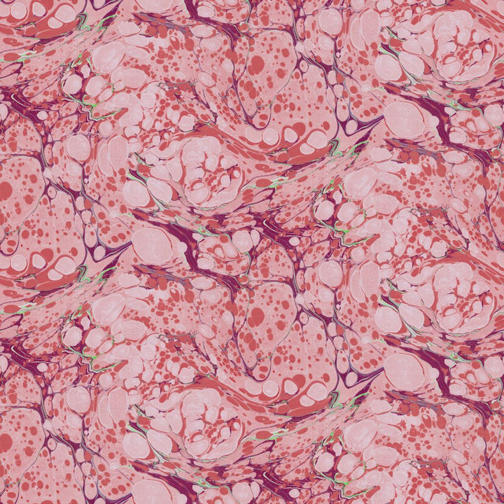An abstract marbled pattern featuring pink, coral, and magenta fluid art swirls with small green accents.