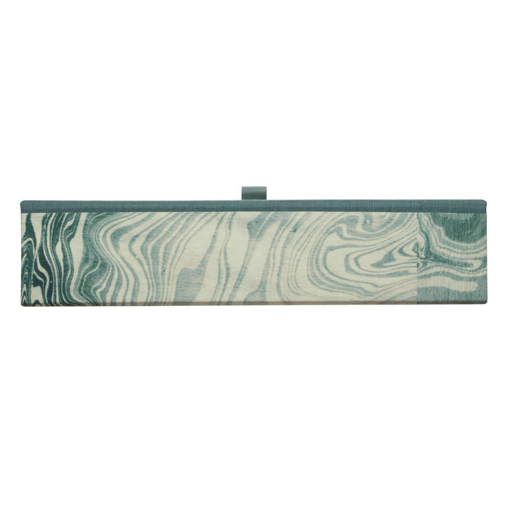 Marble-patterned blue and grey box file on a white background