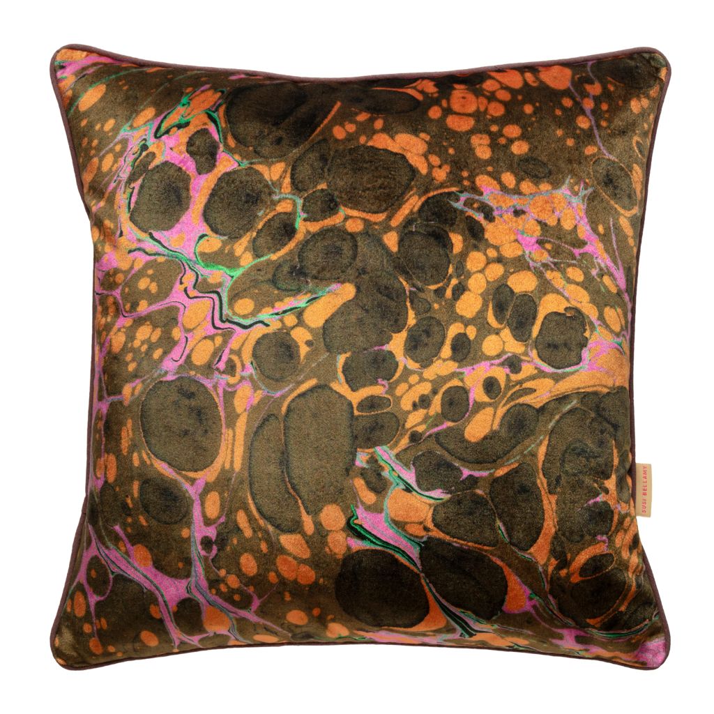 A square throw pillow featuring an abstract marbled pattern in dark brown, orange, and pink with a small beige brand tag on the right edge, set against a plain white background.