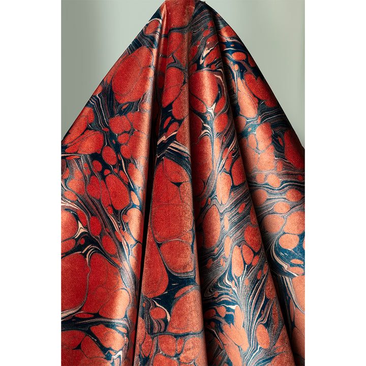 Draped patterned velvet fabric