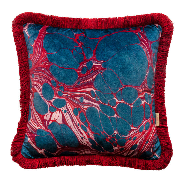 Blue and red velvet cushion