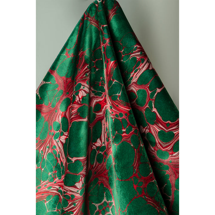 Draped patterned velvet fabric