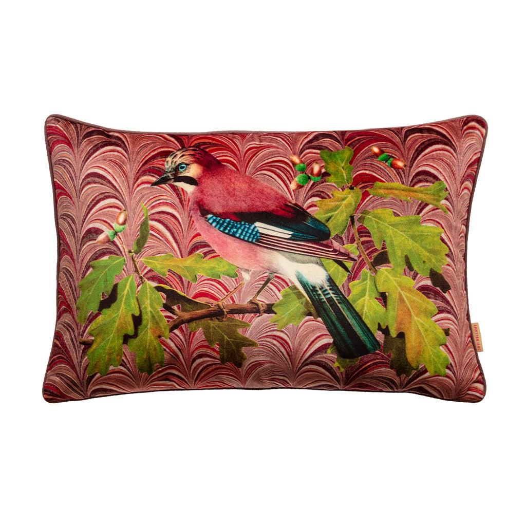 Red velvet cushion with bird on