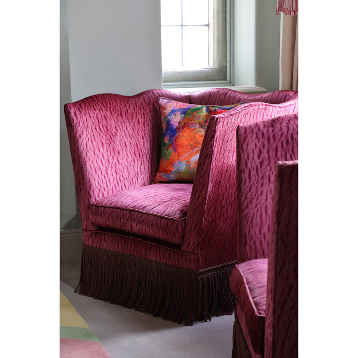Vintage chairs upholstered in purple patterned velvet