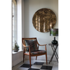 olive velvet cushion on checkerboard marble floor