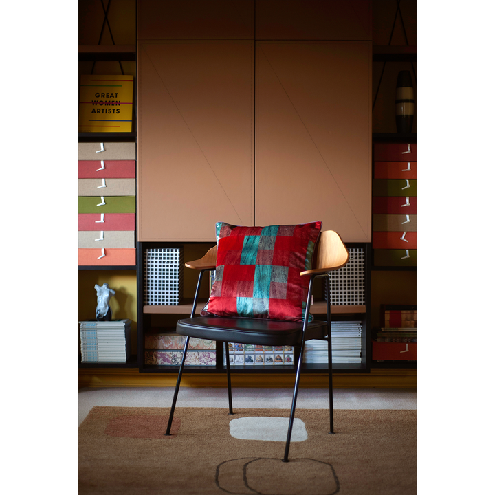 Chair cushion midcentury vibe with bookshelf