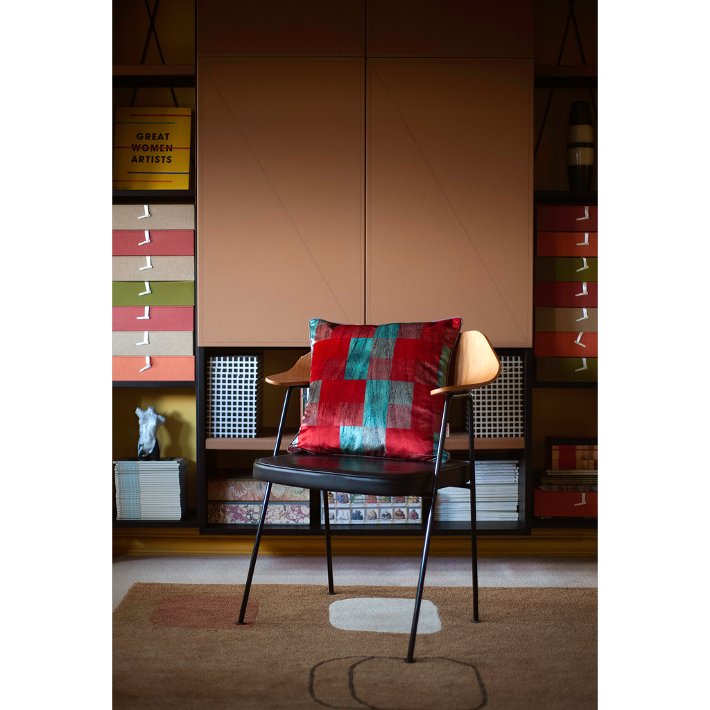 Chair cushion midcentury vibe with bookshelf