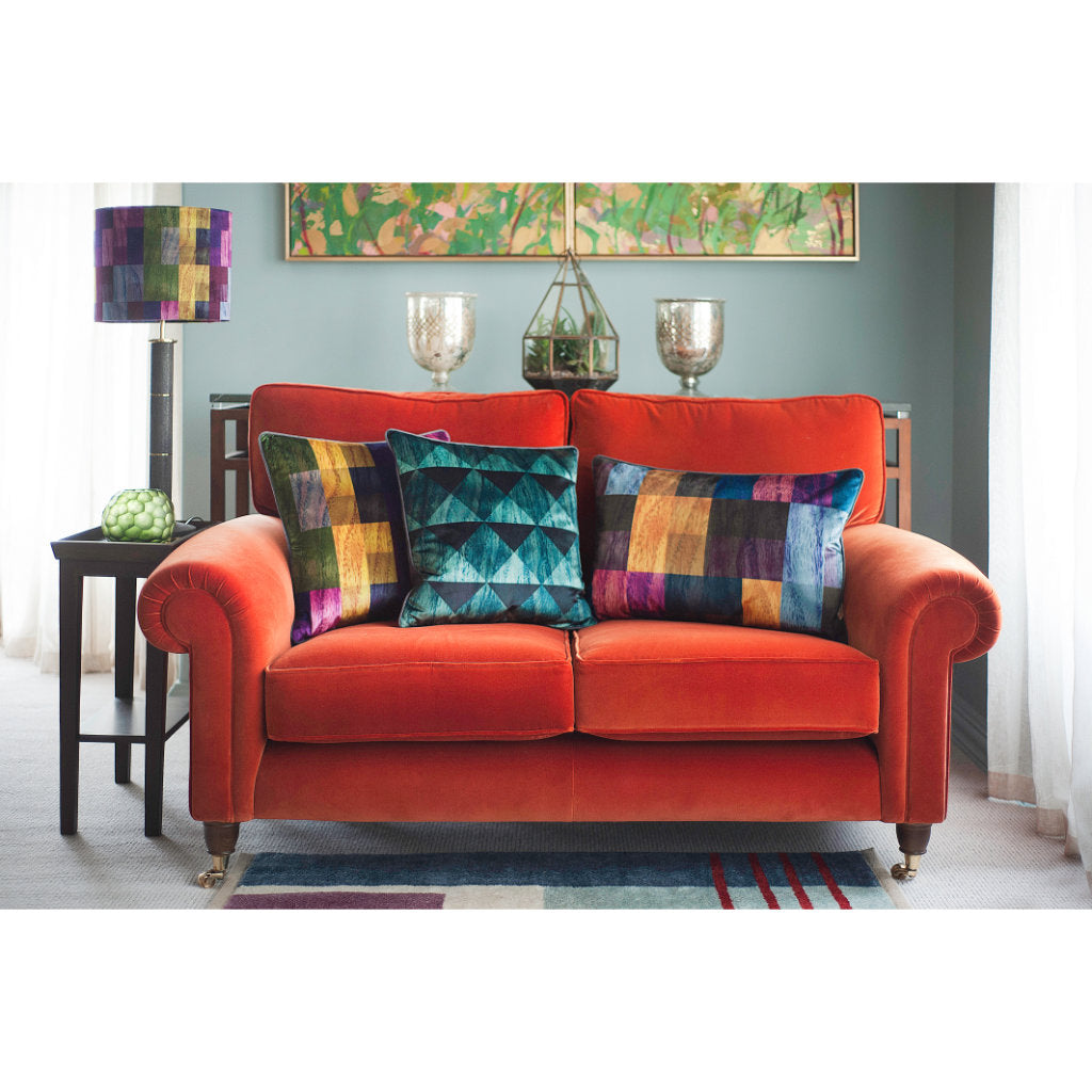 orange sofa and scatter cushions